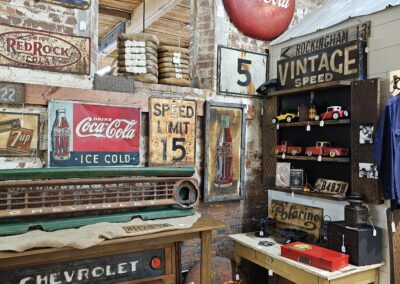 Vintage signs and memorabilia collection display.