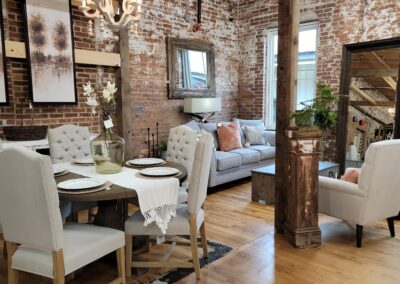 Elegant dining room interior with exposed brick walls