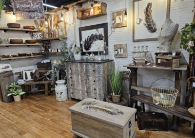 Rustic home decor store interior with wooden furniture.