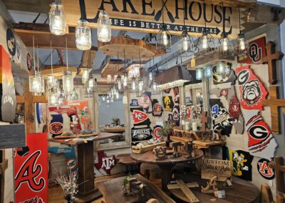 Rustic home decor shop with various college sports logos.