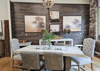 Elegant dining room with wooden wall and artwork