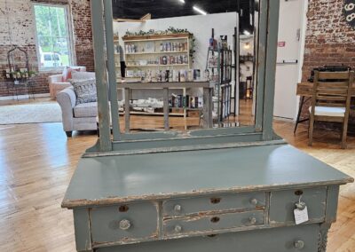 Vintage green metal cabinet in a rustic interior