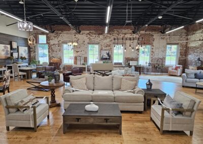 Elegant furniture showroom interior with exposed brick walls