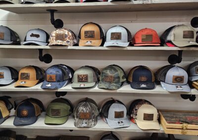 Variety of baseball caps displayed on store shelves