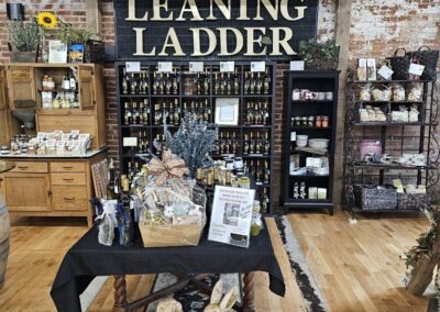 Leaning ladder shelf in cozy rustic interior store.