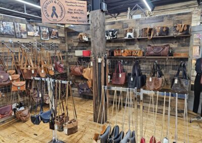 Leather bags and accessories display in boutique shop